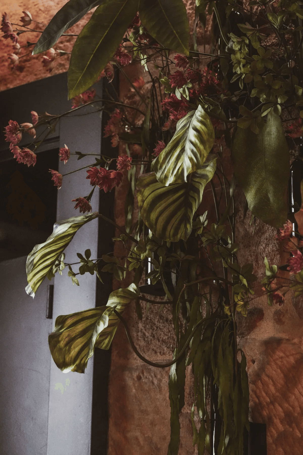Café de Paris — détail signature végétale